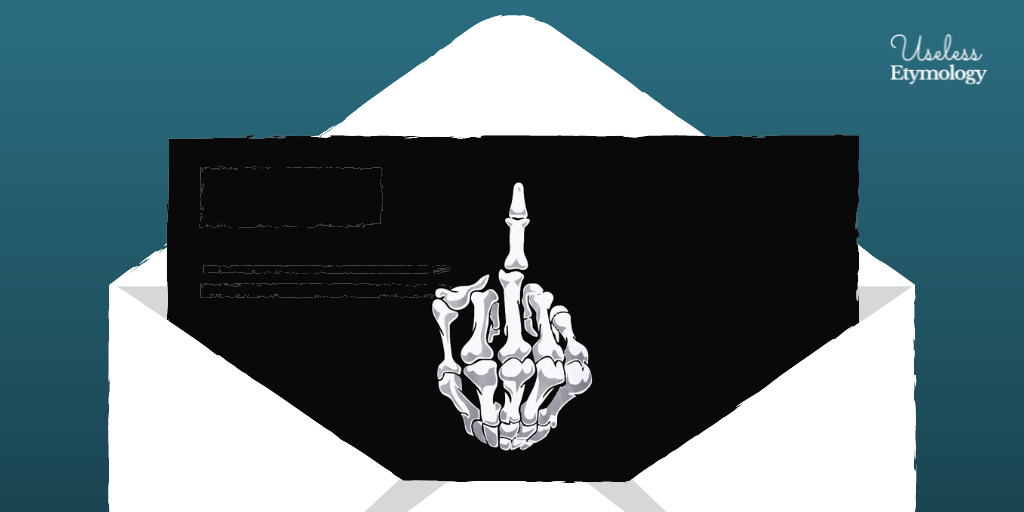 An open envelope containing a black piece of paper. On the paper is a skeleton's hand with its middle finger lifted.
